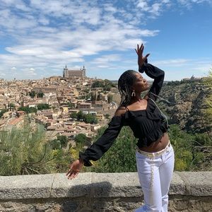 Black ruffle off the shoulder top